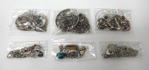 Mostly silver jewellery, comprising; a charm bracelet, two further bracelets, a bangle, a curb link watch Albert chain, with two silver and enamelled