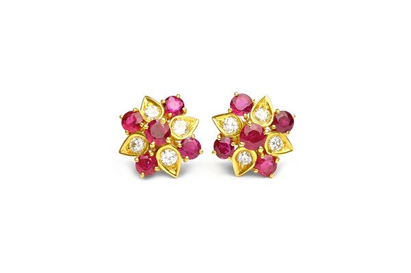 A pair of gold, ruby and diamond cluster earstuds, each claw set with five circular cut rubies and mounted with four circular cut diamonds within drop