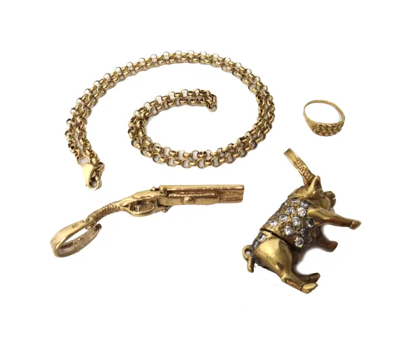 A 9ct gold and colourless gem set pendant, designed as an articulated pig, a 9ct gold pendant, designed as a twin barrelled shot gun, a 9ct gold child