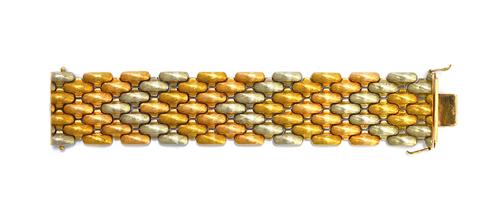 A three colour gold bracelet, in a wide textured curved link design, on a snap clasp, detailed 750, circa 1950, length 19cm, with two foldover safety