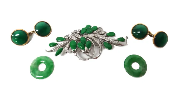 A white gold, jade and diamond brooch, designed as a spray, mounted with pear shaped jades and with small circular cut diamonds, detailed 18 K, two ja