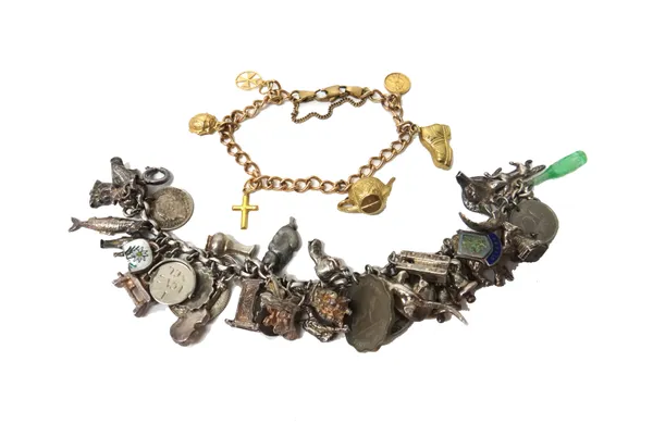 A 9ct gold curb link bracelet, with a sprung hook shaped clasp, fitted with six mostly 9ct gold charms, including a boot and a kettle, gross weight 11