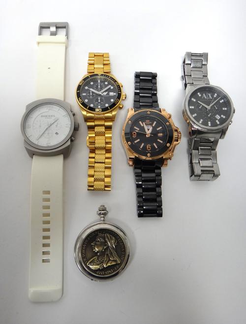 A Diesel 5 Bar diver's chronograph wristwatch, an Oniss Paris gentleman's day/date rose gold plated wristwatch, on a black ceramic strap, an Emporio A