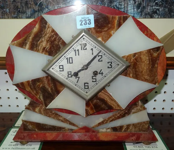 An Art Deco onyx and marble cased mantel clock. B10