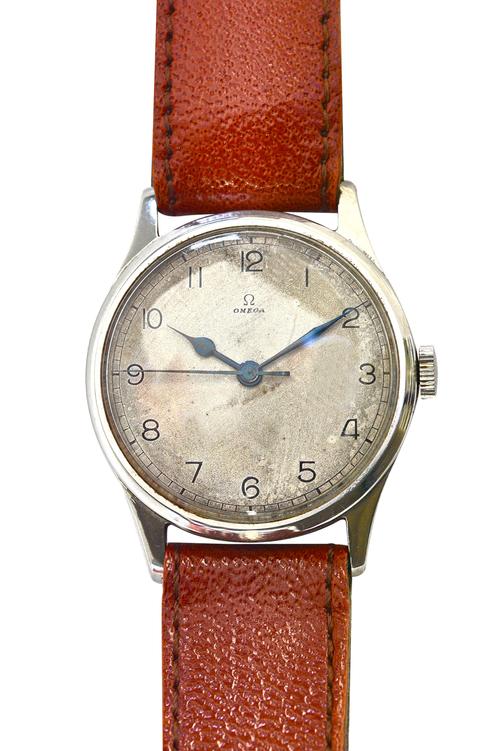 An Omega steel circular cased gentleman's wristwatch, with a signed jewelled movement, the signed silvered dial with black Arabic numerals, centre sec