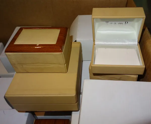 A group of faux cream leather and wooden edge earring and necklace boxes, approx 80, stamped 'Tramp'. (qty) S3