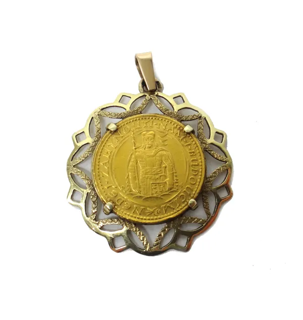 A Czechoslovakia gold dukat 1923, in a gold pendant mount, detailed 585, combined weight 6.3 gms.