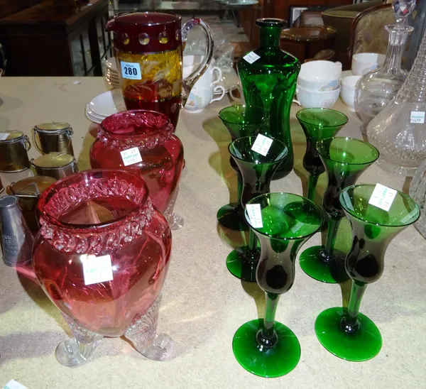 Glassware, comprising; a green decanter and six glasses, a pair of cranberry coloured vases and a red and yellow cut glass jug. (qty) S2