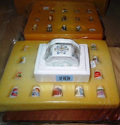 Collector's items, including a small group of ceramic thimbles and ceramic music boxes, (qty). S4