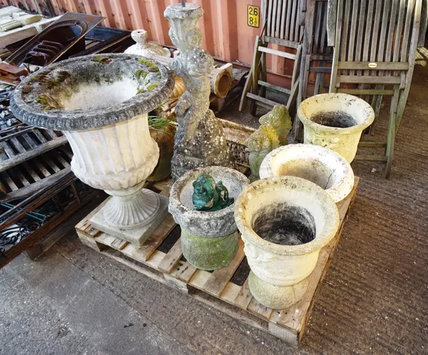 A pallet of reconstituted stone garden statuary, including; a pair of jardinières, two temple dogs, a sea lion and four other items, (9) OUT