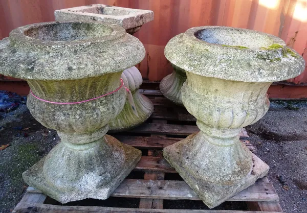A pair of reconstituted stone jardinières, with semi-fluted bodies on square bases, 51cm wide x 62cm high (2) OUT
