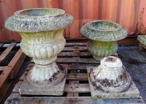 A pair of reconstituted stone jardinières, with semi-fluted bodies on square bases, 50cm wide x 62cm high (2) OUT