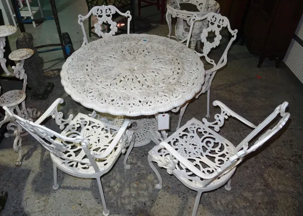 A white painted aluminium circular garden table, 95cm diameter, together with four armchairs, (5).  K4