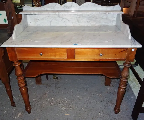 A 20th century pine washstand, with white marble gallery top over a two drawer base, on ring turned supports, 100cm wide x 100cm high. K3