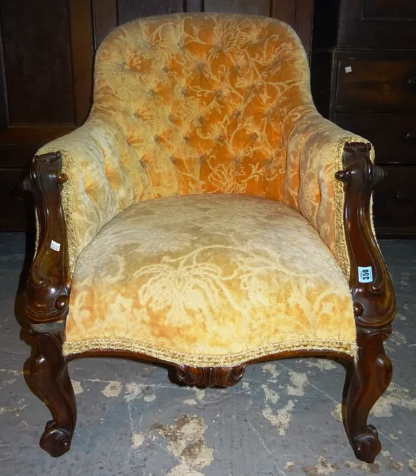 A Victorian button back mahogany framed tub chair. A9