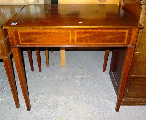 An Edwardian mahogany side table, with lift top, 82cm wide. K2