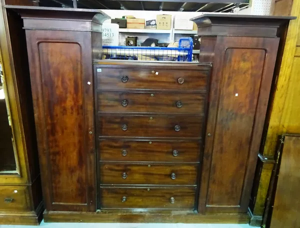 A Victorian mahogany compactum wardrobe, (lacks cresting) 200cm wide. M6