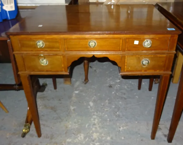 An Edwardian mahogany dressing table with hinged top above dummy drawers, 82cm wide. K2
