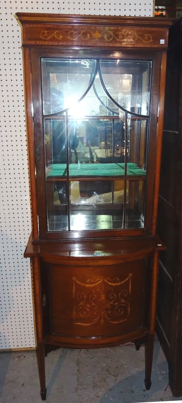 A late 19th century inlaid mahogany display cabinet, on square tapering supports, 66cm wide x 189cm high. M10