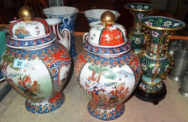 A group of four pairs of 20th century decorated vases, including two cloisonné vases, lidded Chinese vases and others. (qty) S3