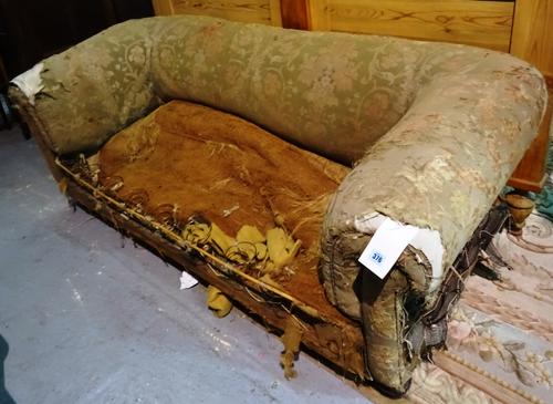 A Victorian mahogany framed sofa, with rollover arms, 184cm long, (a.f). Formerly used in a photo shoot for Kings of Leon. K10