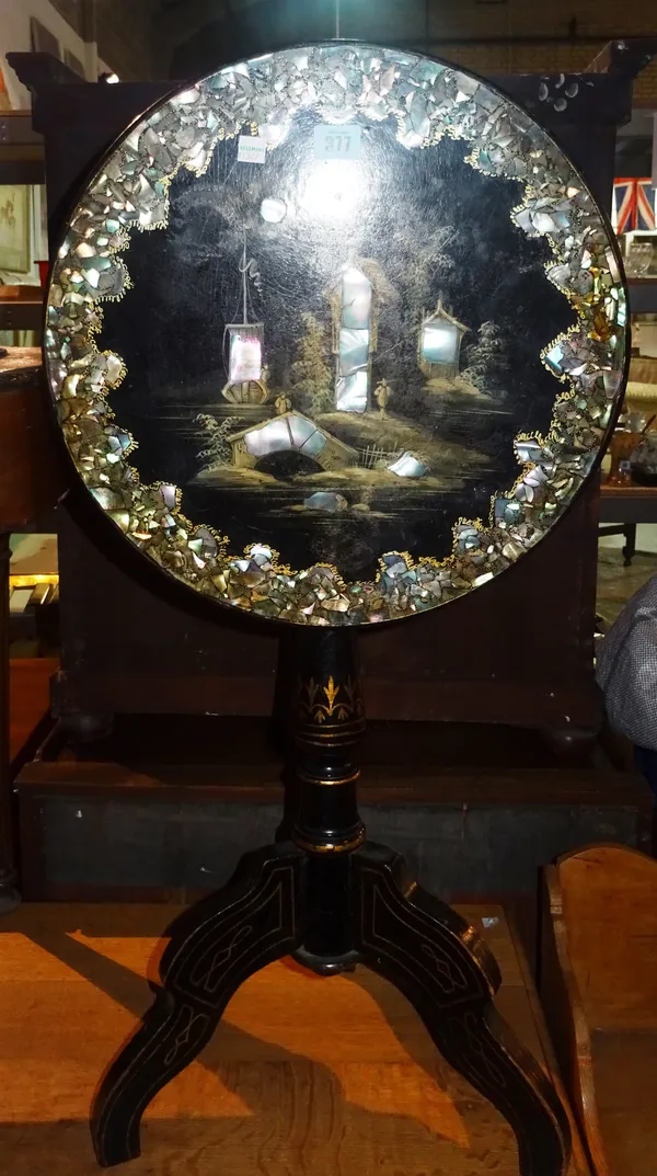 A Victorian papier mâché circular occasional table, with mother-of-pearl inlay, 41cm wide x 61cm high. B9