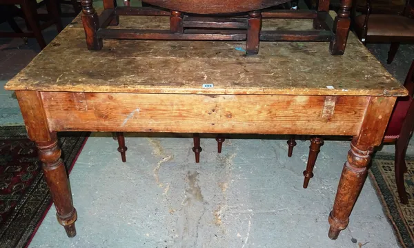 A Victorian pine kitchen table, on tapering turned supports, 122cm wide x 74cm high. G8