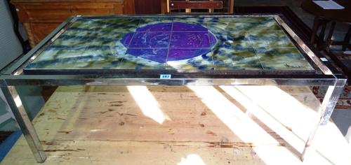 A 20th century chrome coffee table with ceramic tile top, indistinctly signed 'BELARTI', 102cm wide x 38cm high. G4