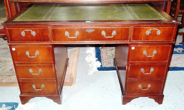 A 20th century mahogany pedestal desk, with green leather inset top, 122cm wide x 75cm high. J8