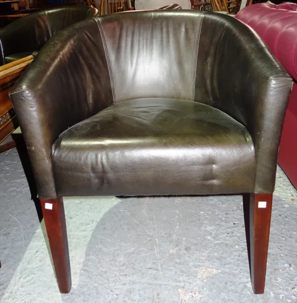 A set of four 20th century mahogany framed tub back armchairs, with faux green leather upholstery, (4). J4