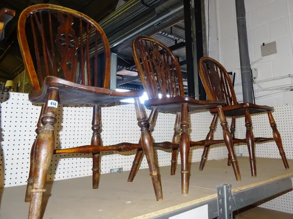 A set of four 19th century ash and elm wheel back scullery chairs, (4). S4