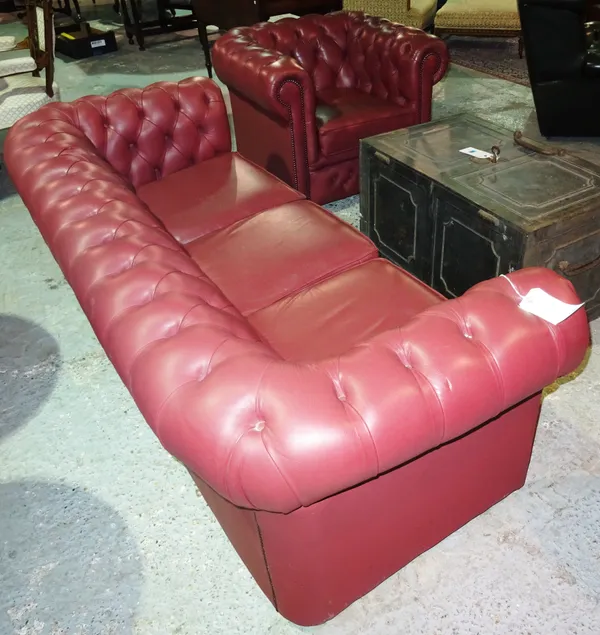 A 20th century pink leatherette button upholstered Chesterfield sofa, 192cm wide, together with an armchair, (2). H4