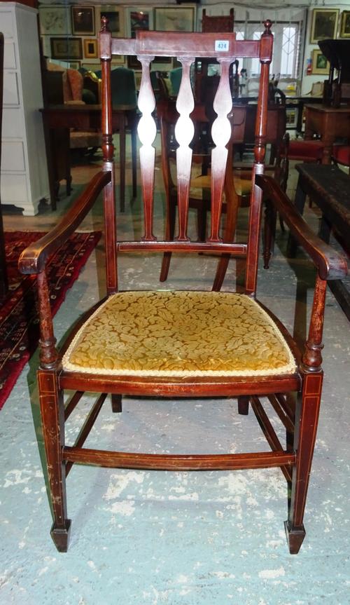 An Edwardian mahogany three splat open armchair. K5