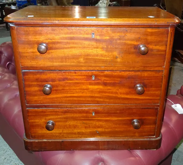 A Victorian mahogany small chest of three drawers, 63cm wide, together with a 1960's Scandinavian bentwood multi-leg walnut occasional table, 53cm wid