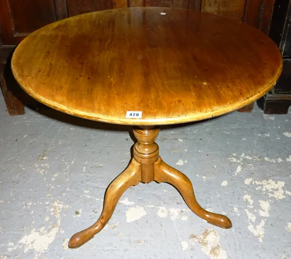 A George III mahogany tripod table, 77cm wide. K7