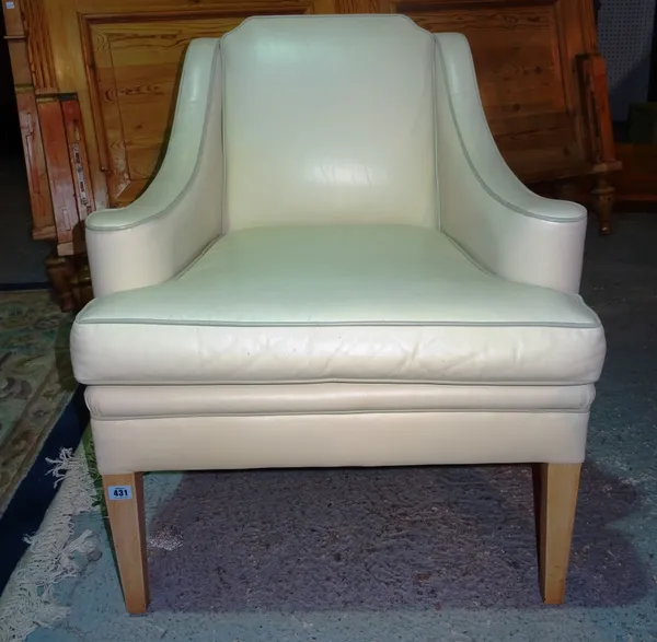 A 20th century pine framed white leather armchair. K6