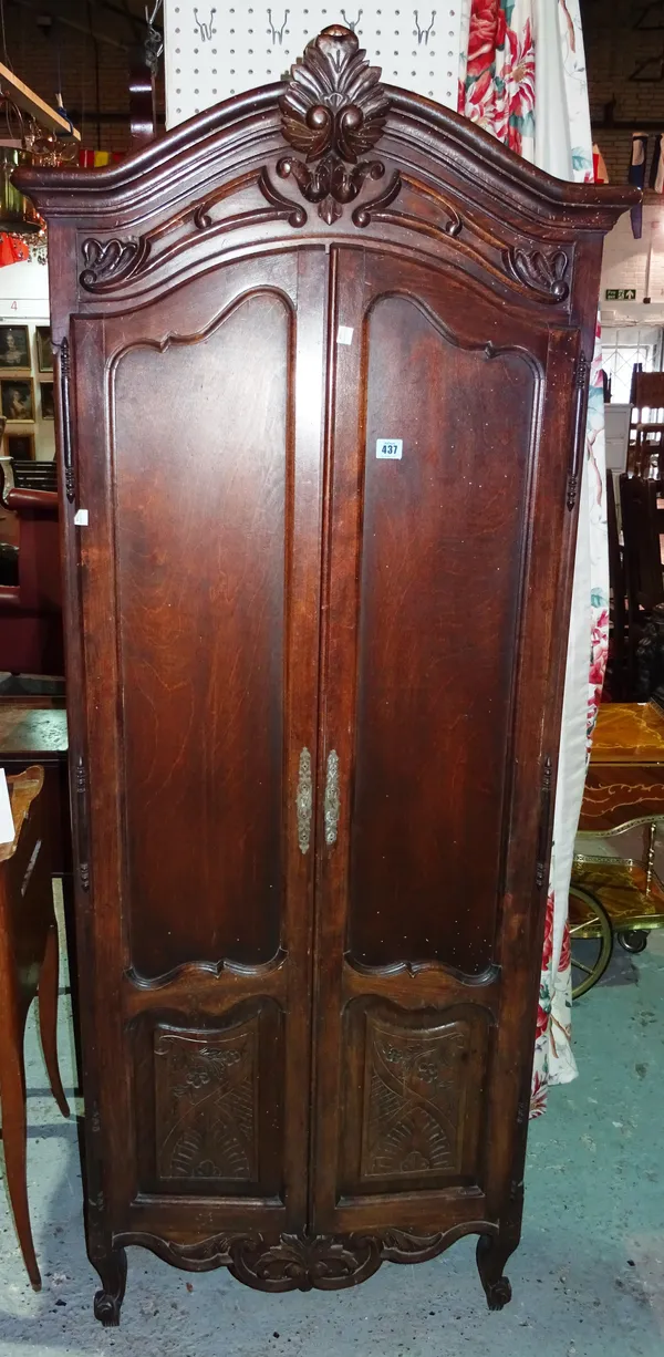 A 19th century Continental oak two door bookcase, in the form of a miniature armoire, 71cm wide. M4