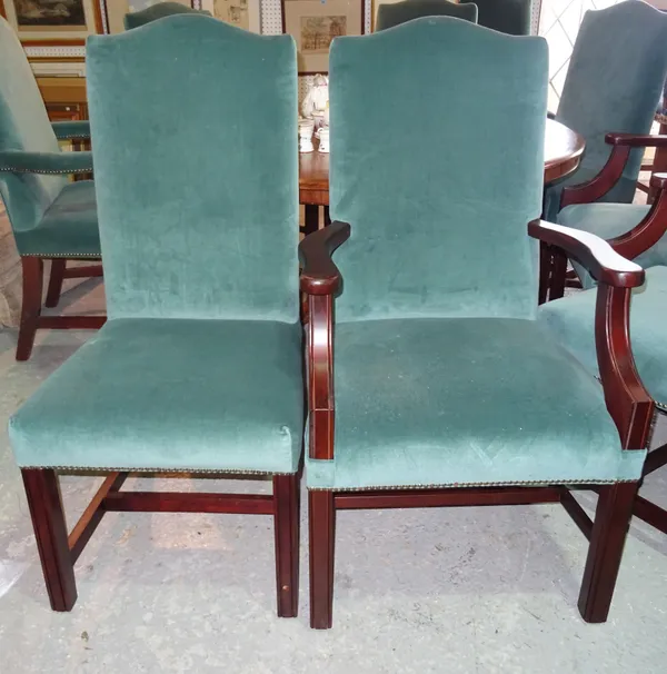 A set of eleven 20th century mahogany dining chairs, with blue upholstery, (11). C6
