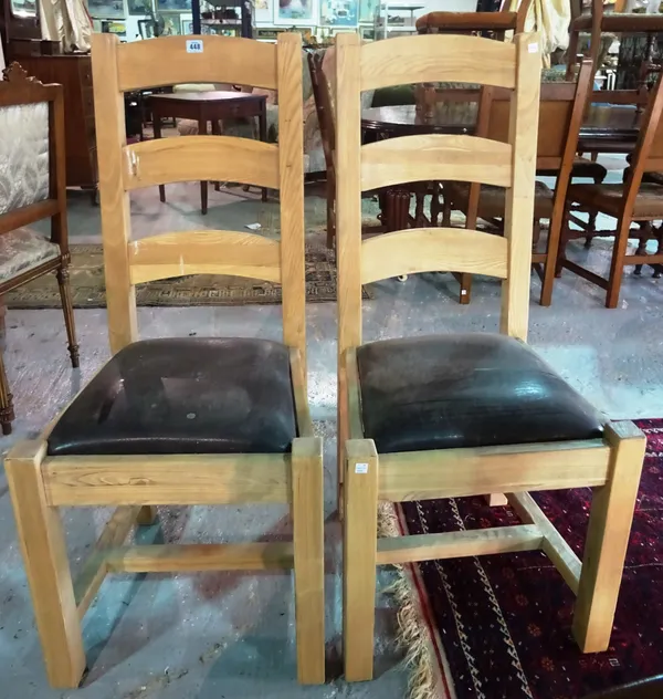 A set of six 20th century oak bar back dining chairs, (6). F9