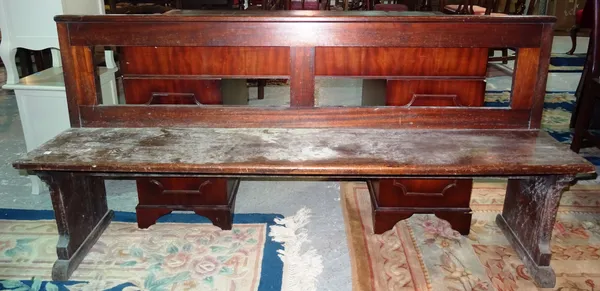 An early 20th century mahogany pew type bench, 156cm wide.  J8