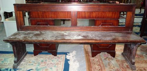 An early 20th century mahogany pew type bench, 156cm wide.  J8