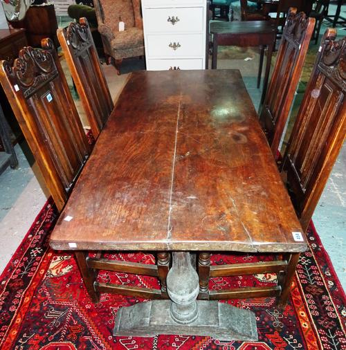 A rectangular oak refectory table, with trestle supports united by stretcher, 156cm wide. H6