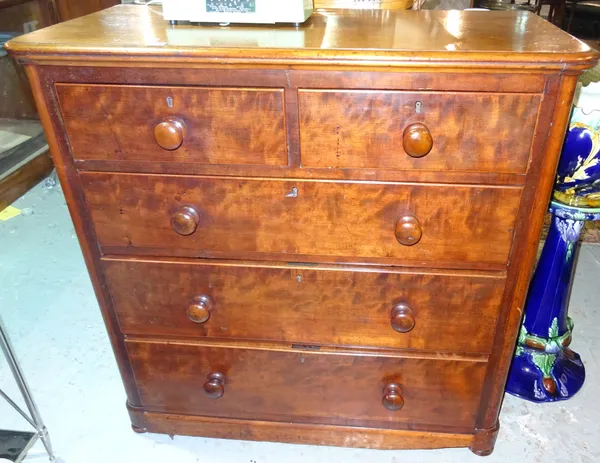 A Victorian mahogany chest, the rectangular top with rounded corners and a moulded edge, with two short and three long graduated drawers, on plinth ba