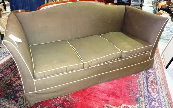 A brown upholstered three seat sofa, 202cm wide. E3