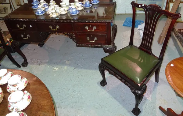 A mahogany kneehole dressing table and two chairs, both in the mid-18th century style, with carved cabriole legs and gadrooned moulded edges, 140cm wi