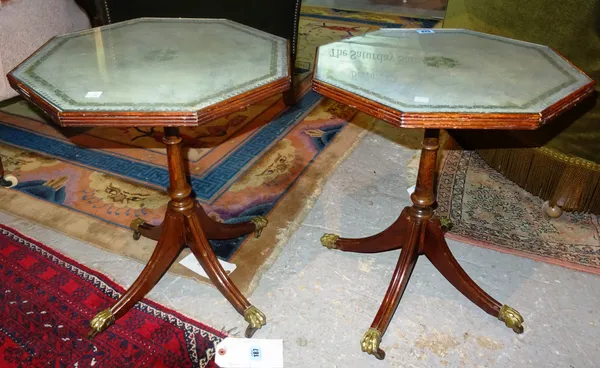 A pair of 20th century mahogany leather topped octagonal low tables, 41cm wide x 49cm high. (2). F6