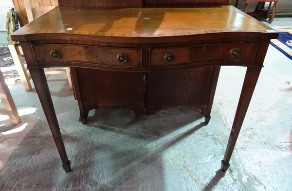 A mahogany, cross-banded and boxwood strung serpentine fronted serving table, with two frieze drawers, on square tapering supports, 100cms wide. G9