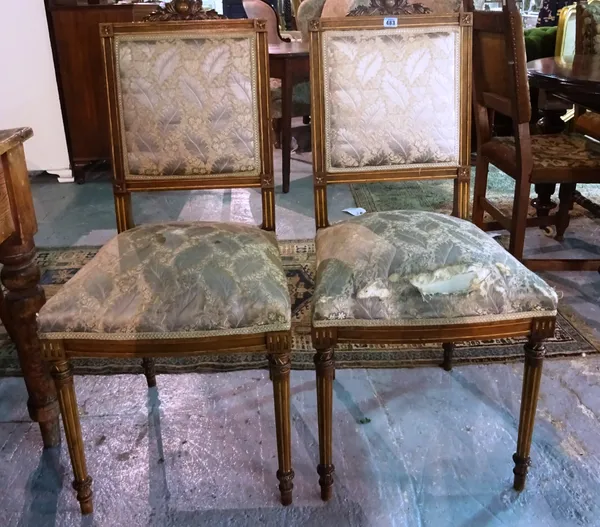 A set of three French walnut salon chairs, in the Louis XVI style, with green leaf upholstery, together with a pair of George IV rosewood dining chair
