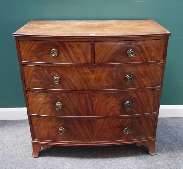 A Regency mahogany bowfront chest of two short and three long graduated drawers, on splayed bracket feet, 107cm wide x 107cm high. G9