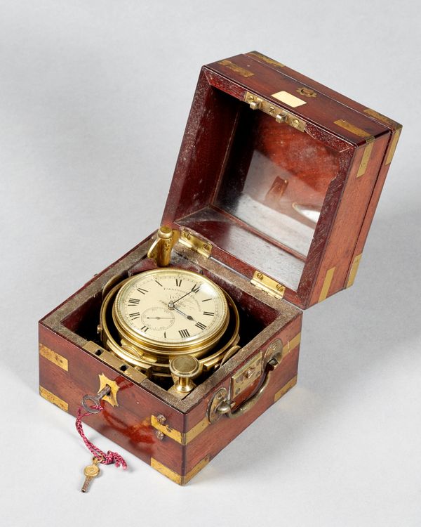 A small brass-bound mahogany cased two-day marine chronometerBy Parkinson & Frodsham, London, London, No. 456, circa 1825The hinged lid centred with a